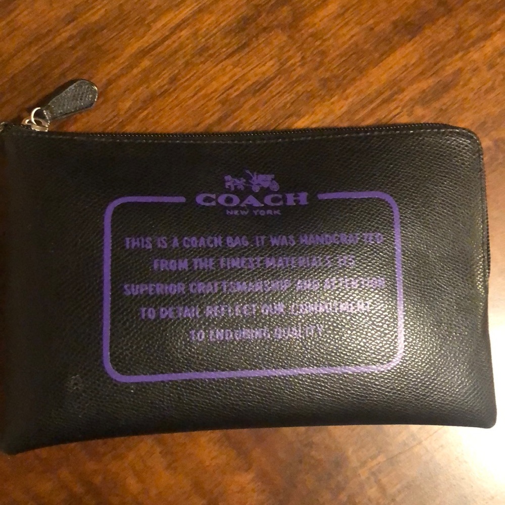 COACH tote.Reversible with matching zipper clutch!